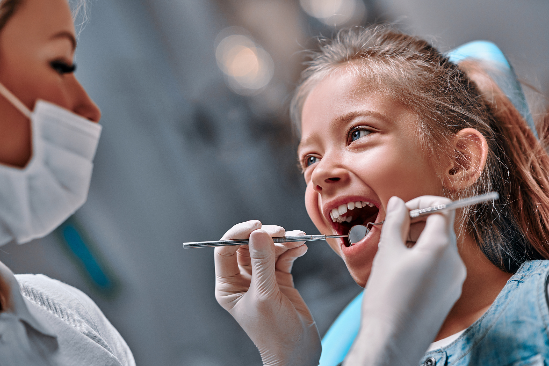 Cute little girl in the dentist chair